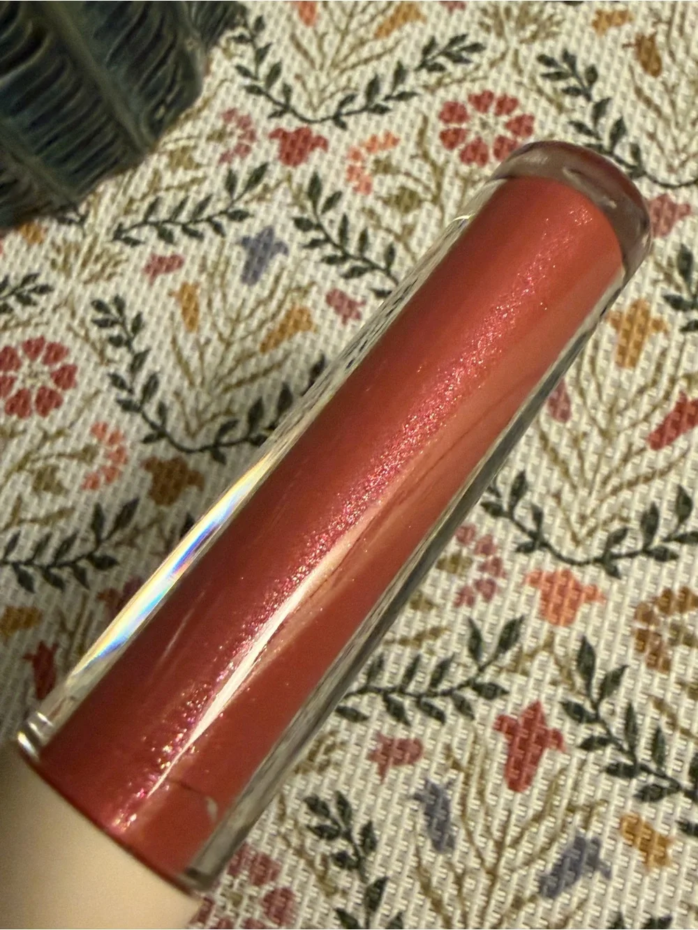 Rare Beauty Glimmer Lip Gloss in Shimmery Deep Coral Pink